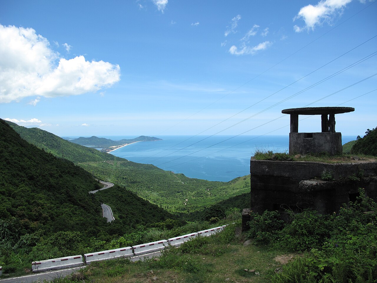 Scenic panoramic ocean view and mountain curves along the Hai Van Pass coastal transit corridor in central Vietnam